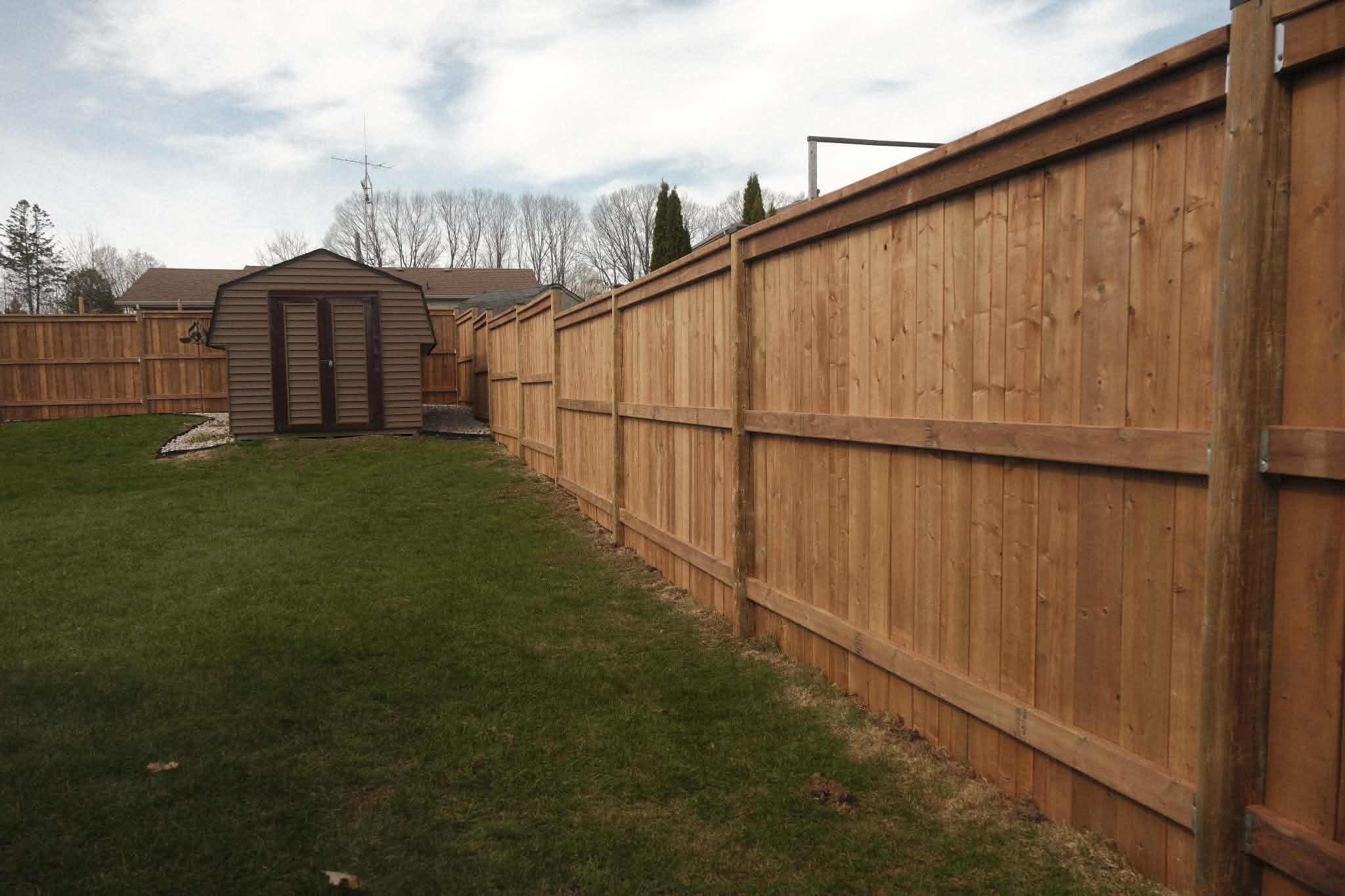 Wood privacy fence built by Roo's Fences